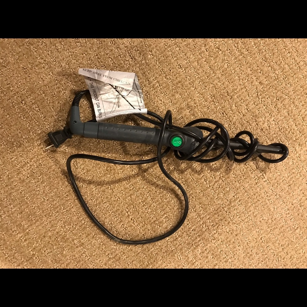 Jose Eber curling rod